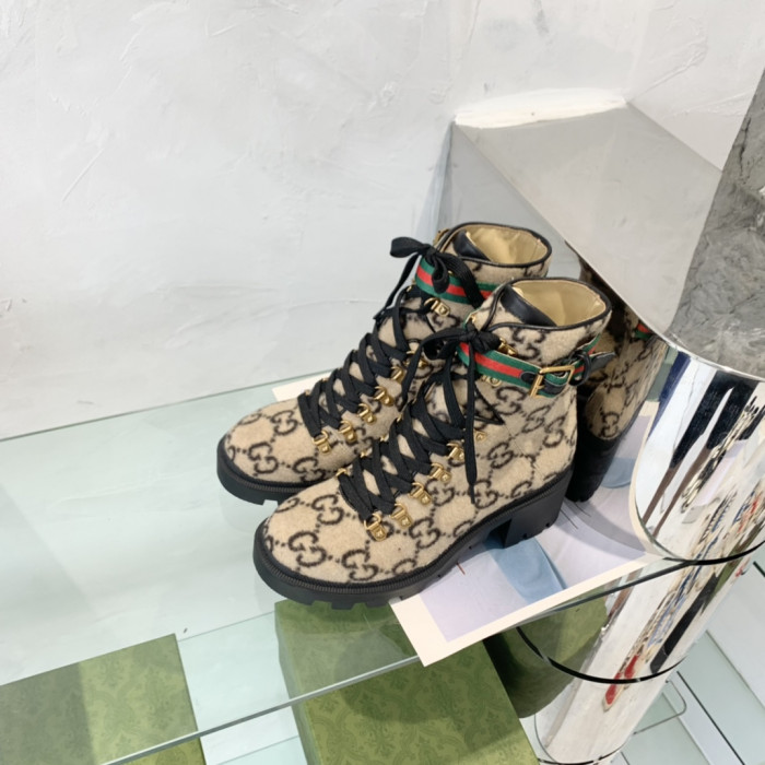 G*u*i boots